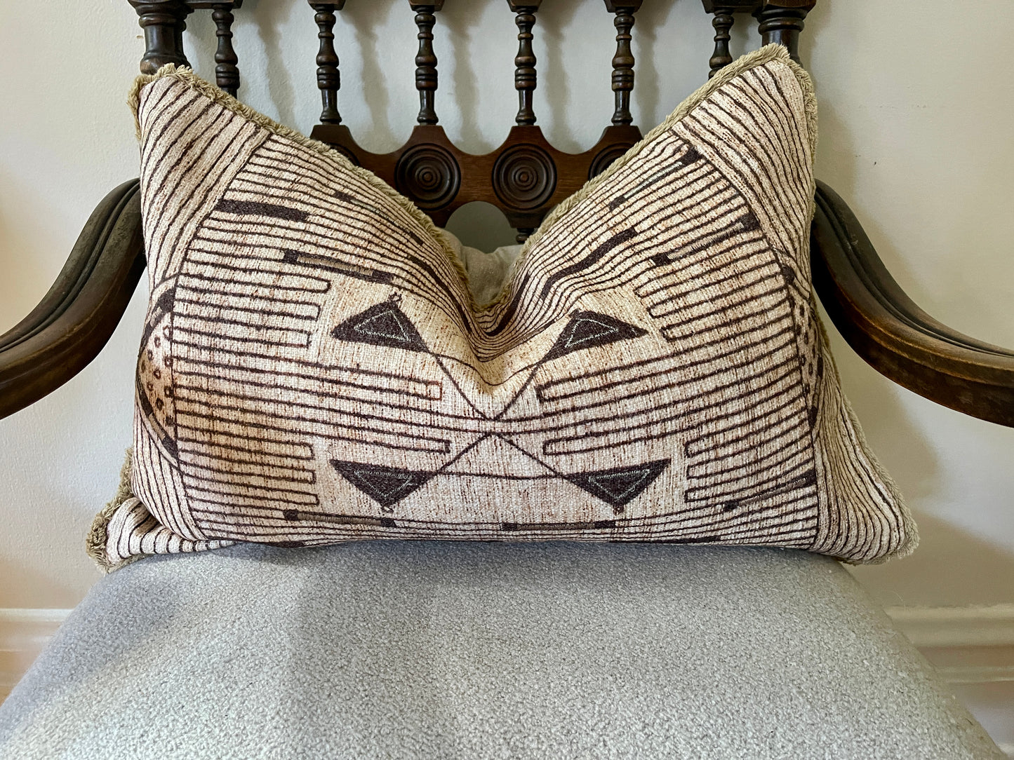 Neutral Geometric Tribal Pillow with Fringed Edges