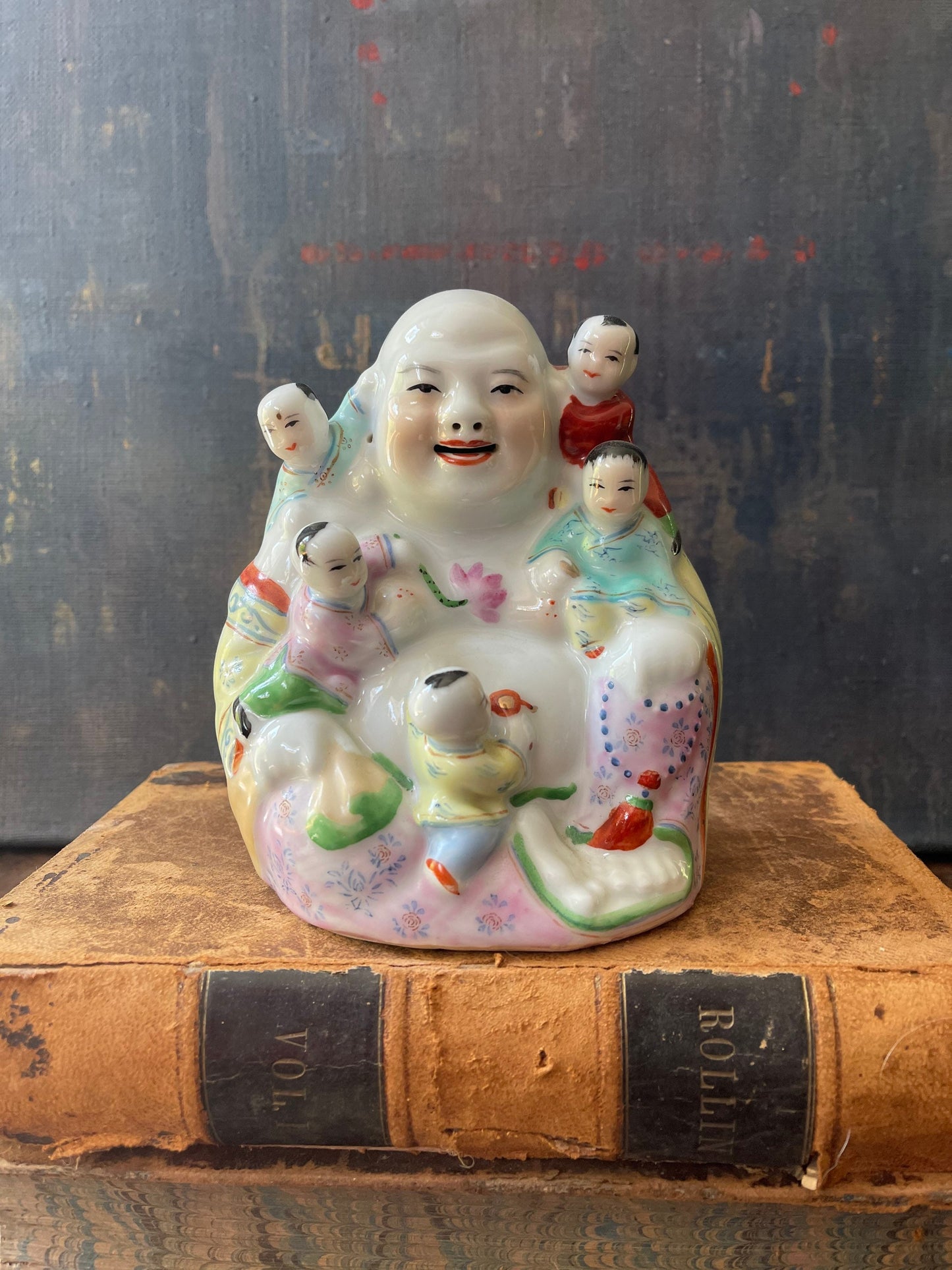 Vintage laughing Buddha with 5 children