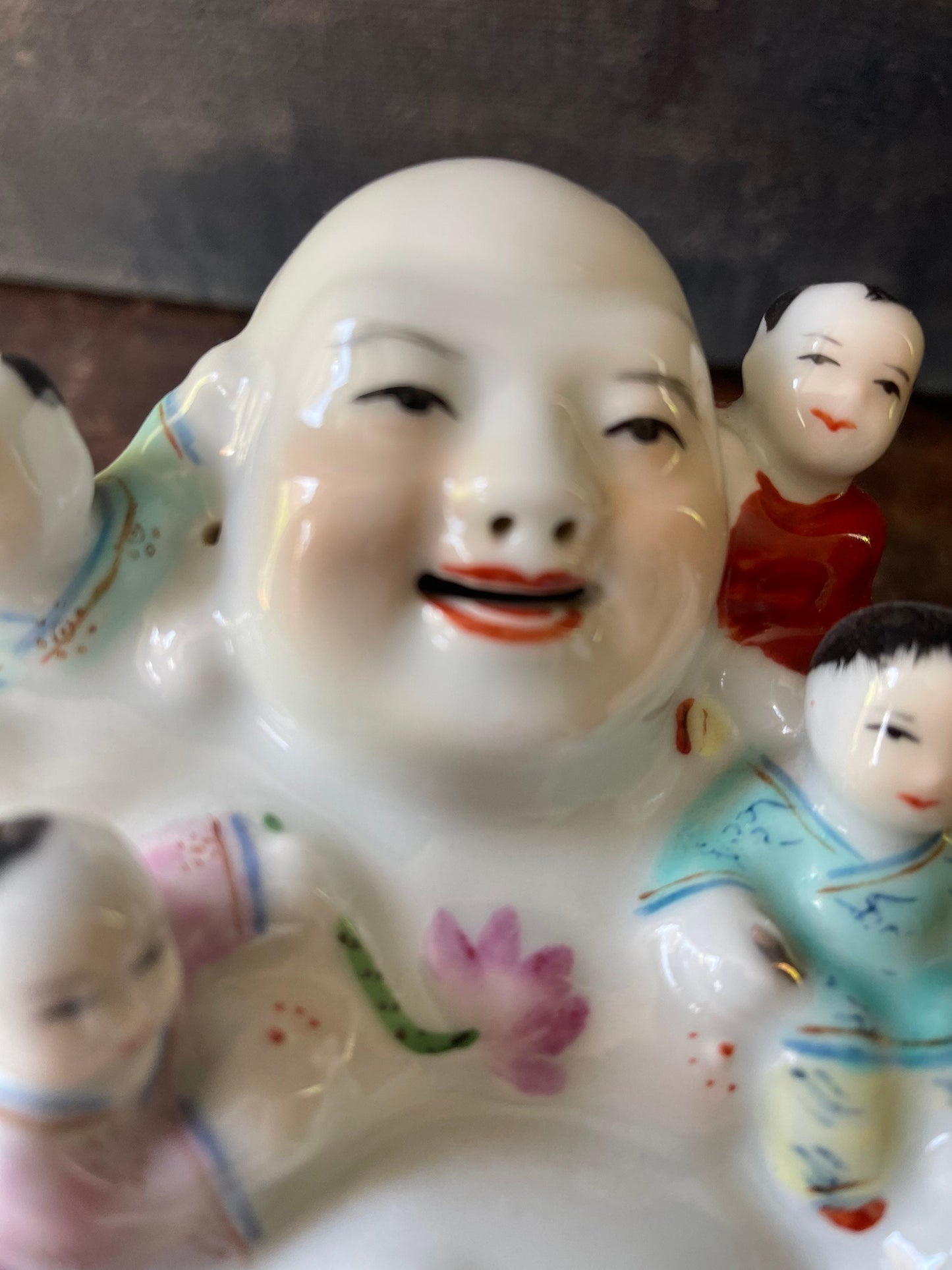 Vintage laughing Buddha with 5 children