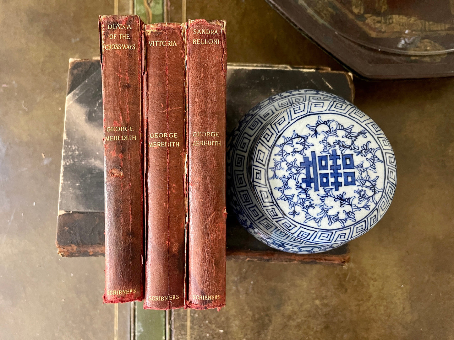 Set a three antique red leather books by George Meredith