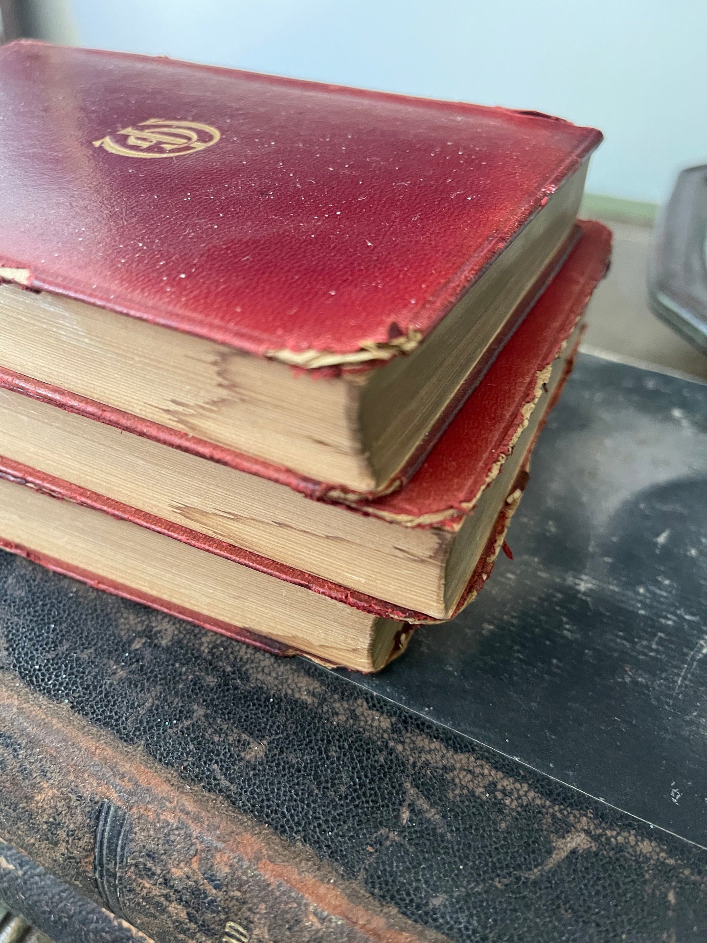 Set a three antique red leather books by George Meredith