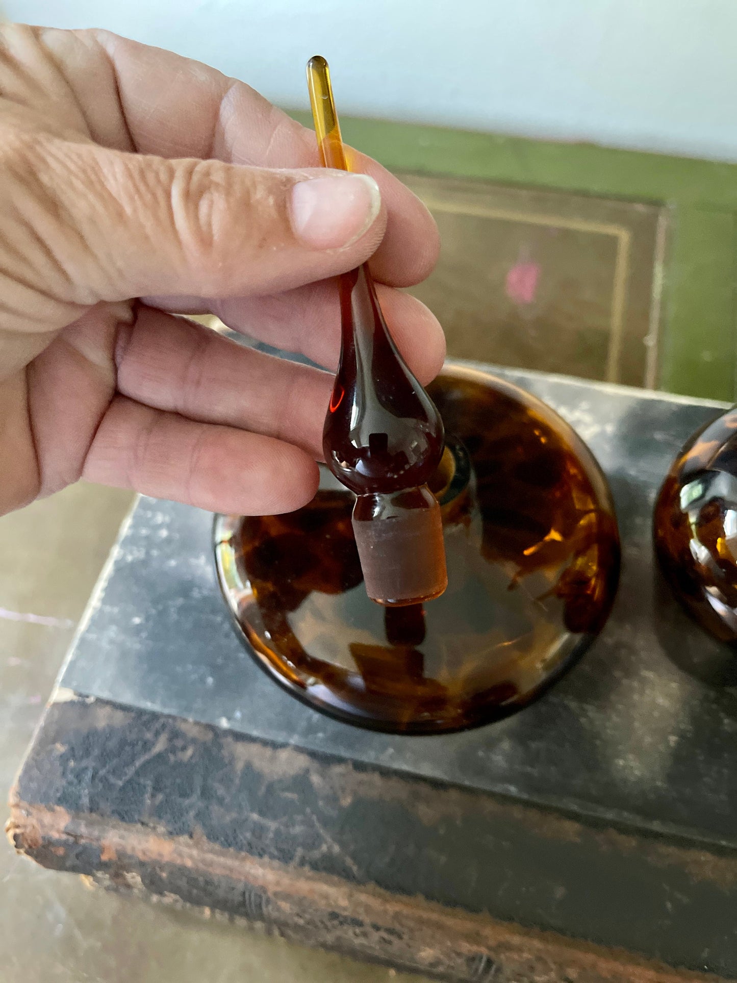 Pair of hand blown tortoise glass perfume bottles